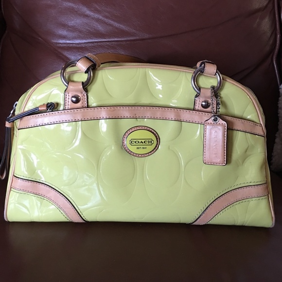 Beautiful light green Coach hand bag.