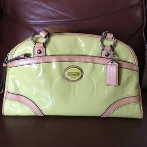 Beautiful light green Coach hand bag.