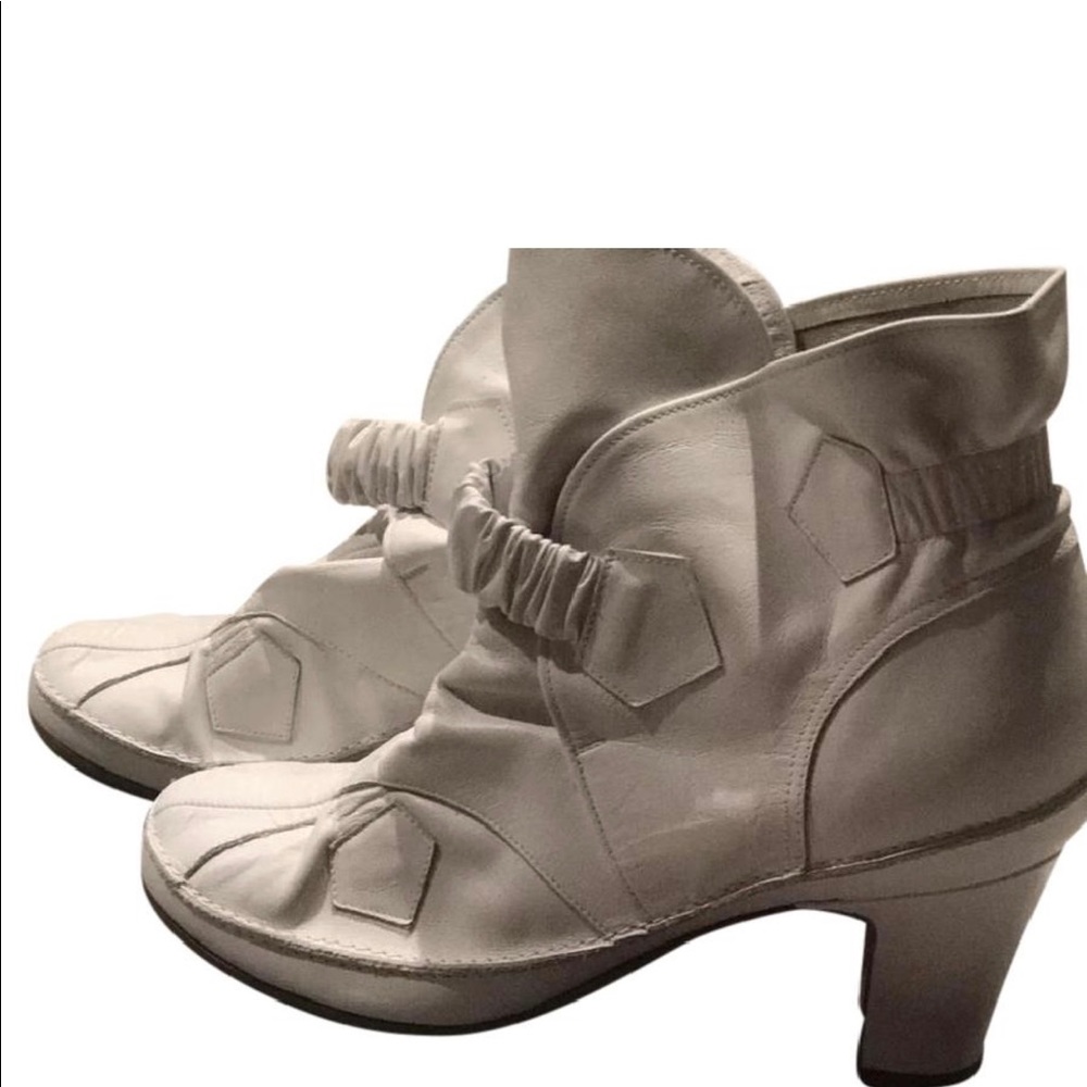 Brand new Vivienne Westwood white ankle boots.