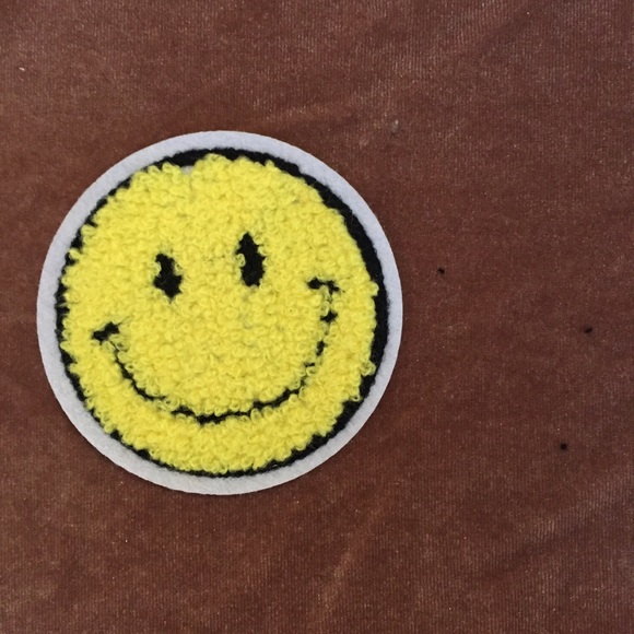 Smiley face towel patch