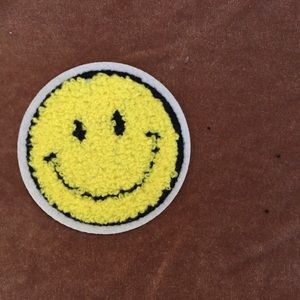Smiley face towel patch