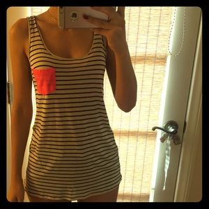 Striped tank with hot pink pocket.