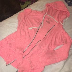 pink/orange zip up jacket