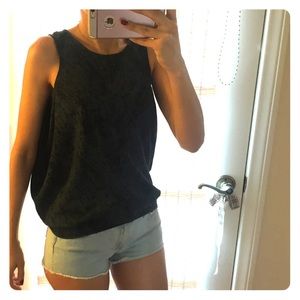 Cool high neck sleeveless blouse.