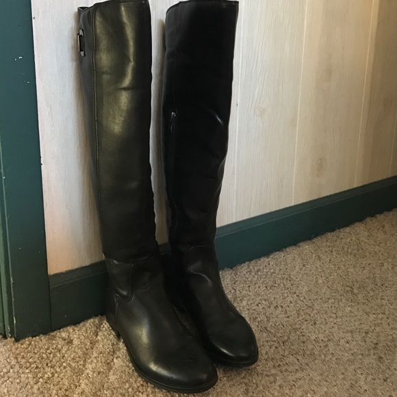 Black knee-high leather boots