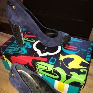 C. Wonder Navy Suede pump with Glitter heel