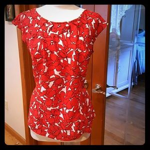 Red floral blouse
