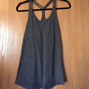 Cotton racer back tank top with braid detail.