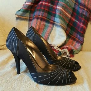 Black satin covered pumps
