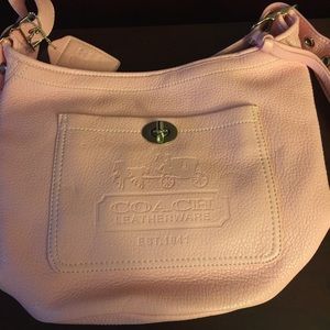 Light pink Coach purse.