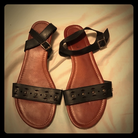 Studded black sandal.