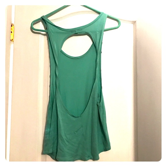 Teal open back shirt.