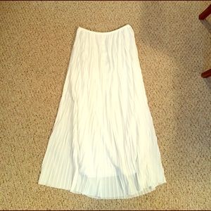 White pleaded maxi skirt