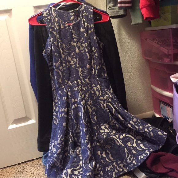 Crime colored dress covered in blue lace