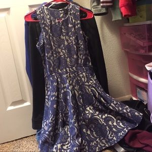 Crime colored dress covered in blue lace