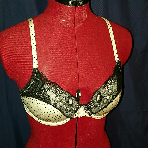 White polka dot and black lace bra