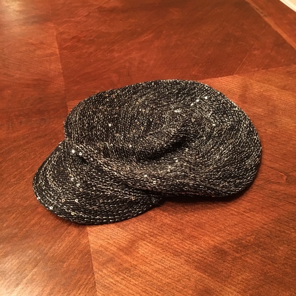 Black and silver Newsboy hat