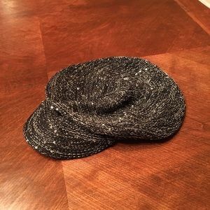 Black and silver Newsboy hat