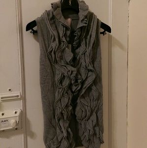 Grey knit vest with ruffles