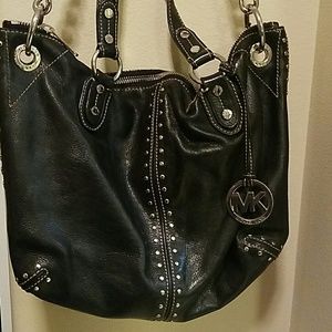 Black leather Michael Kors purse rarely used!!!