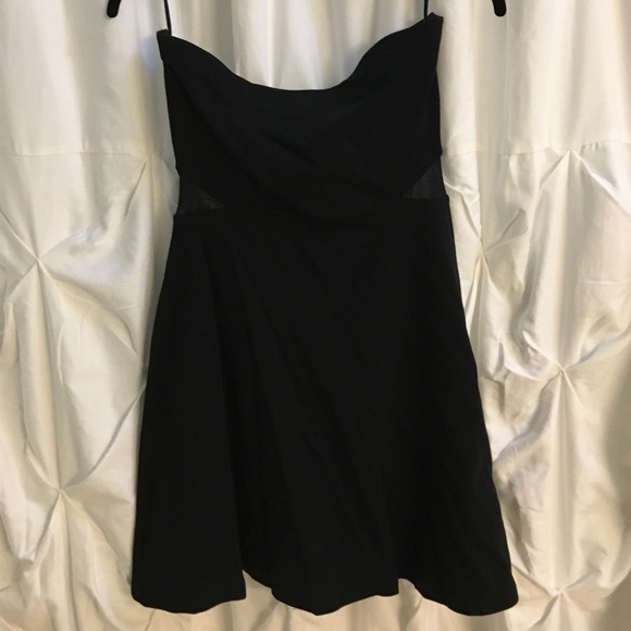 Black bodycon express dress. Never worn.