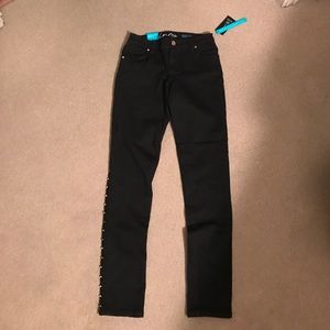 I.N.C denim black skinny leg regular fit jeans.