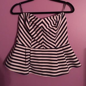 Striped white and navy blue peplum top.