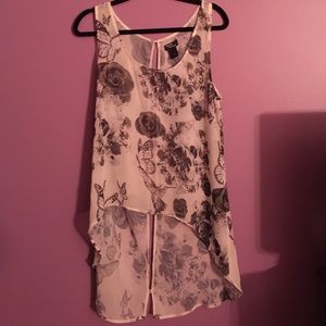 White tunic with grey designs.