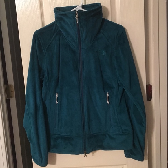 Green/blue fuzzy north face jacket