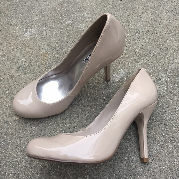Beige patent pumps