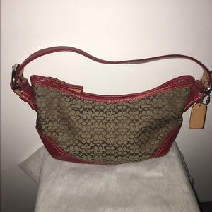 Small Tan Coach with red leather trimming