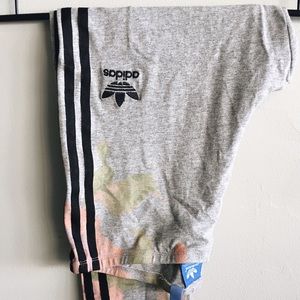 Adidas leggings with a pastel floral design.