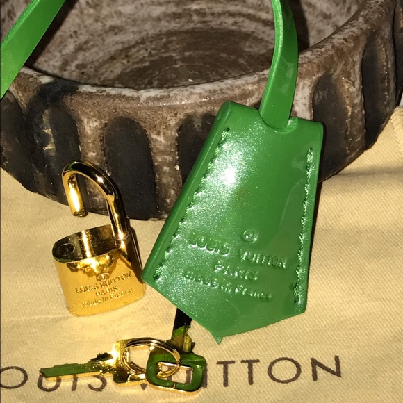 Louis Vuitton lock and key from a bag