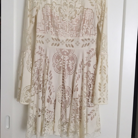 Free People Dresses & Skirts - Free people bell armed lace and lined mini dress.