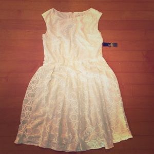 Beautiful white lacey dress. NWT. Pure white.