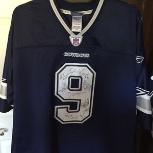 An autographed stitched Dallas Cowboys jersey romo