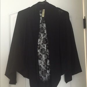 Black lace-back cardigan.