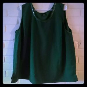 green sleeveless top