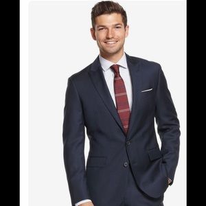 Ryan Seacrest navy blue suit