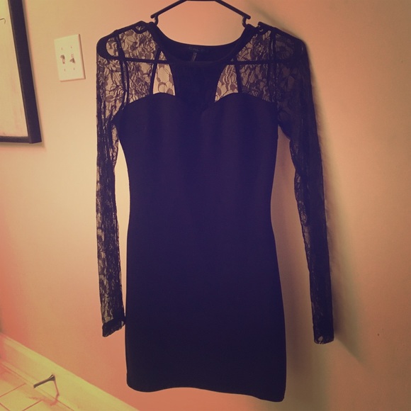 Sexy black lacy dress with cutouts in the back!