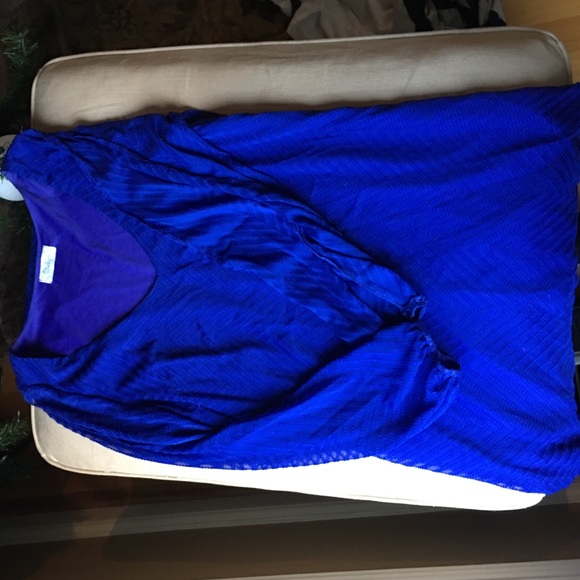 Blue long sleeve dress with slits down arms