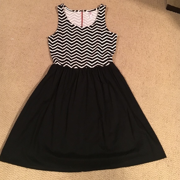 Fully lined, Chevron and black party dress.