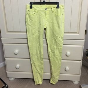 Neon yellow skinny jeans