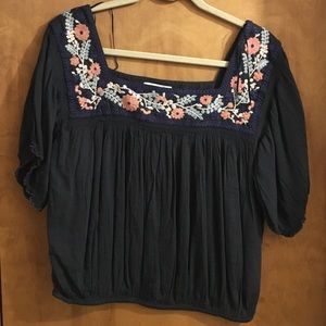 Gray floral blouse with a cinched bottom