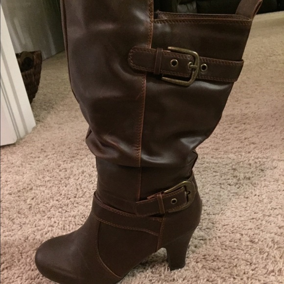 Tall brown leather boots