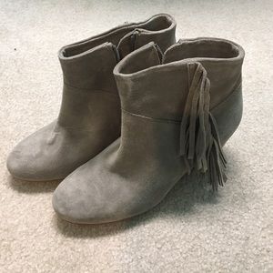 Grey suede fringe booties.