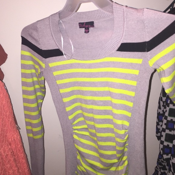 Gray sweater with neon green and black stripes
