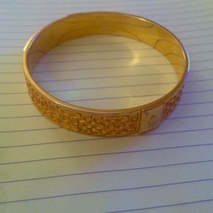 Gold coach bracelet