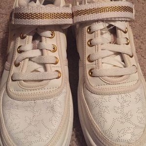 White and gold nikes