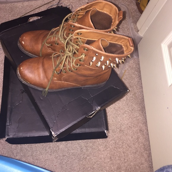 Brown combat boots with spikes